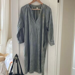 Tie Dyed Shirt Dress in shades of blue and green. Couple of dark spots in dye.